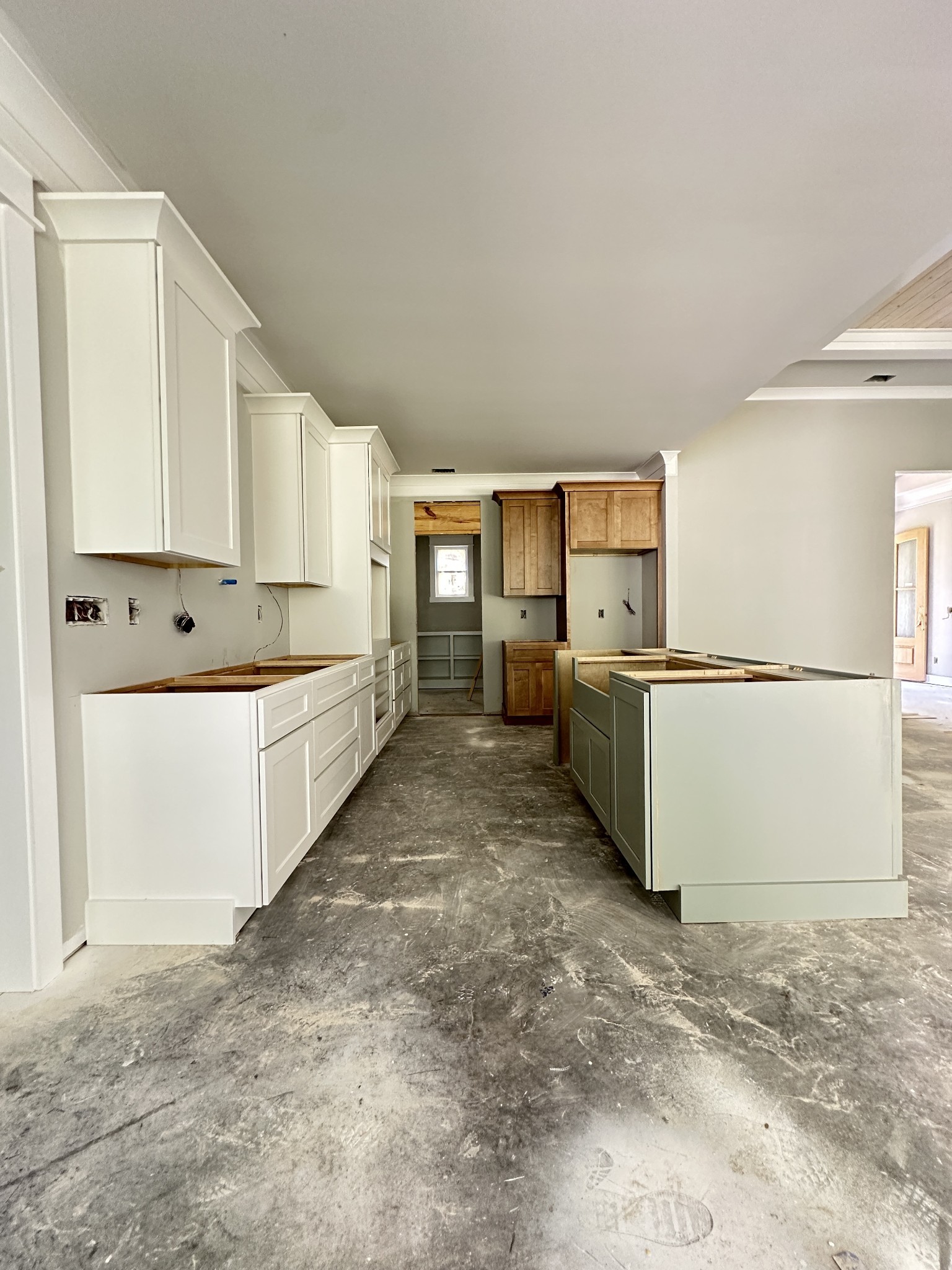 933 Ovoca Lake Road Tullahoma, TN 37388 - Photo 13 of 27 a kitchen with stainless steel appliances granite countertop a refrigerator sink and white cabinets