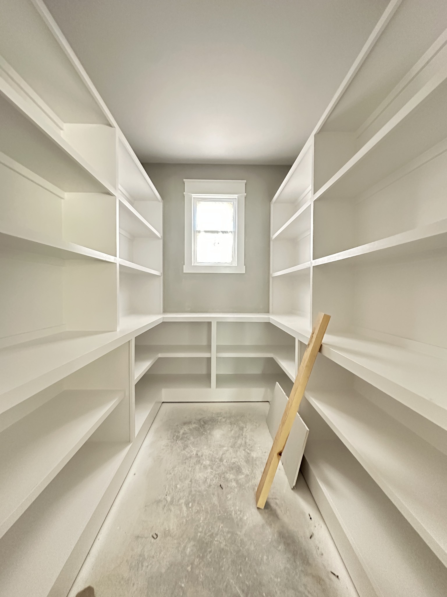 933 Ovoca Lake Road Tullahoma, TN 37388 - Photo 16 of 27 a view of walk in closet with empty racks