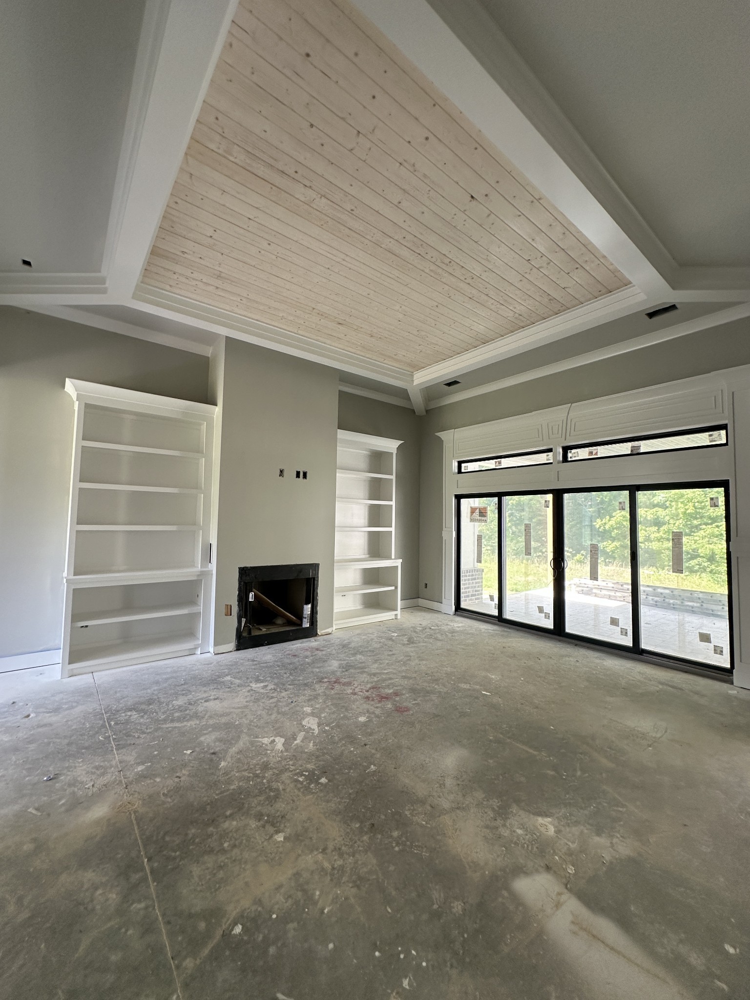933 Ovoca Lake Road Tullahoma, TN 37388 - Photo 16 of 34 an empty room with windows and fireplace