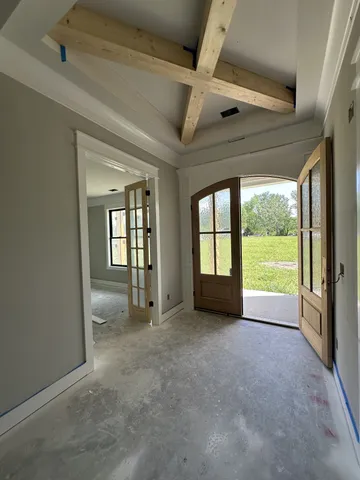 an empty room with windows