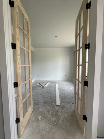 an empty room with windows