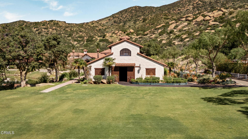 2940 Kuehner Drive Simi Valley, CA 93063 - Photo 30 of 75 a front view of a house with a garden