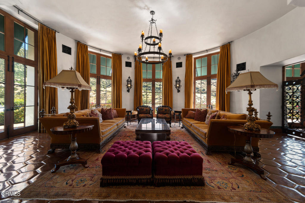 2940 Kuehner Drive Simi Valley, CA 93063 - Photo 51 of 75 a living room with furniture fireplace and a chandelier