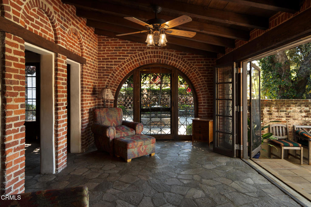 2940 Kuehner Drive Simi Valley, CA 93063 - Photo 69 of 75 a view of a porch with furniture and floor to ceiling window