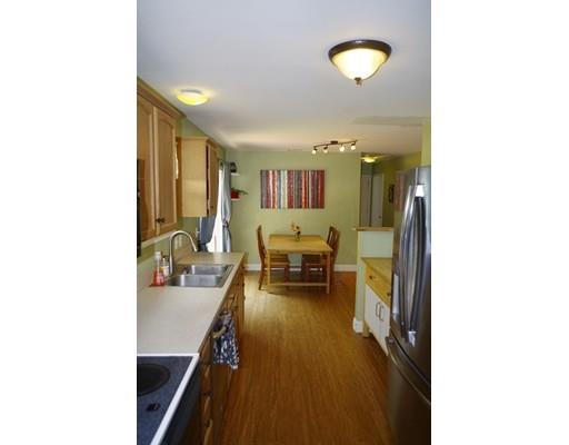 196 Reservoir Road Westhampton, MA 01027 - Photo 11 of 36 a living room with furniture and a chandelier
