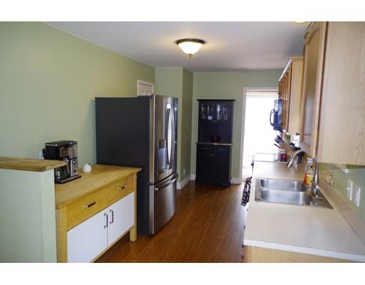 196 Reservoir Road Westhampton, MA 01027 - Photo 12 of 36 a kitchen with a refrigerator and a sink