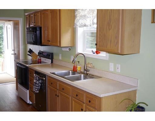 196 Reservoir Road Westhampton, MA 01027 - Photo 13 of 36 a kitchen with a sink cabinets and a window