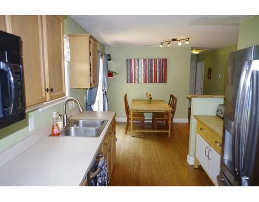 196 Reservoir Road Westhampton, MA 01027 - Photo 14 of 36 a living room with furniture and a flat screen tv