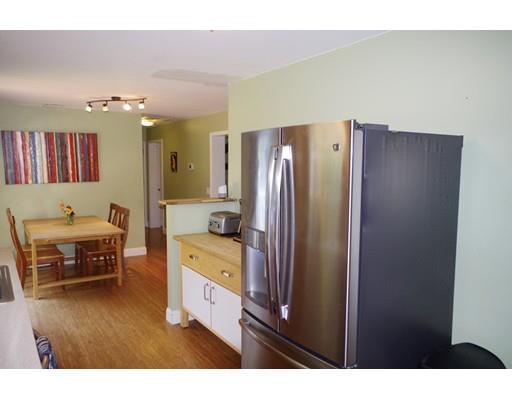 196 Reservoir Road Westhampton, MA 01027 - Photo 15 of 36 a kitchen with stainless steel appliances a refrigerator and a stove
