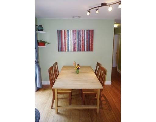 196 Reservoir Road Westhampton, MA 01027 - Photo 16 of 36 a dining room with a table and chairs