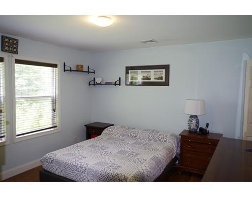 196 Reservoir Road Westhampton, MA 01027 - Photo 21 of 36 a bedroom with a bed and a window