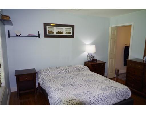 196 Reservoir Road Westhampton, MA 01027 - Photo 22 of 36 a bedroom with a bed and a tv on the dresser