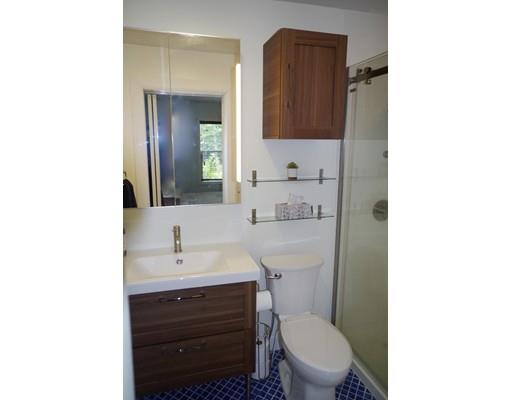 196 Reservoir Road Westhampton, MA 01027 - Photo 26 of 36 a bathroom with a toilet a sink and mirror