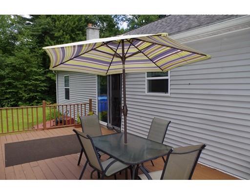196 Reservoir Road Westhampton, MA 01027 - Photo 7 of 36 a view of backyard with outdoor seating and deck