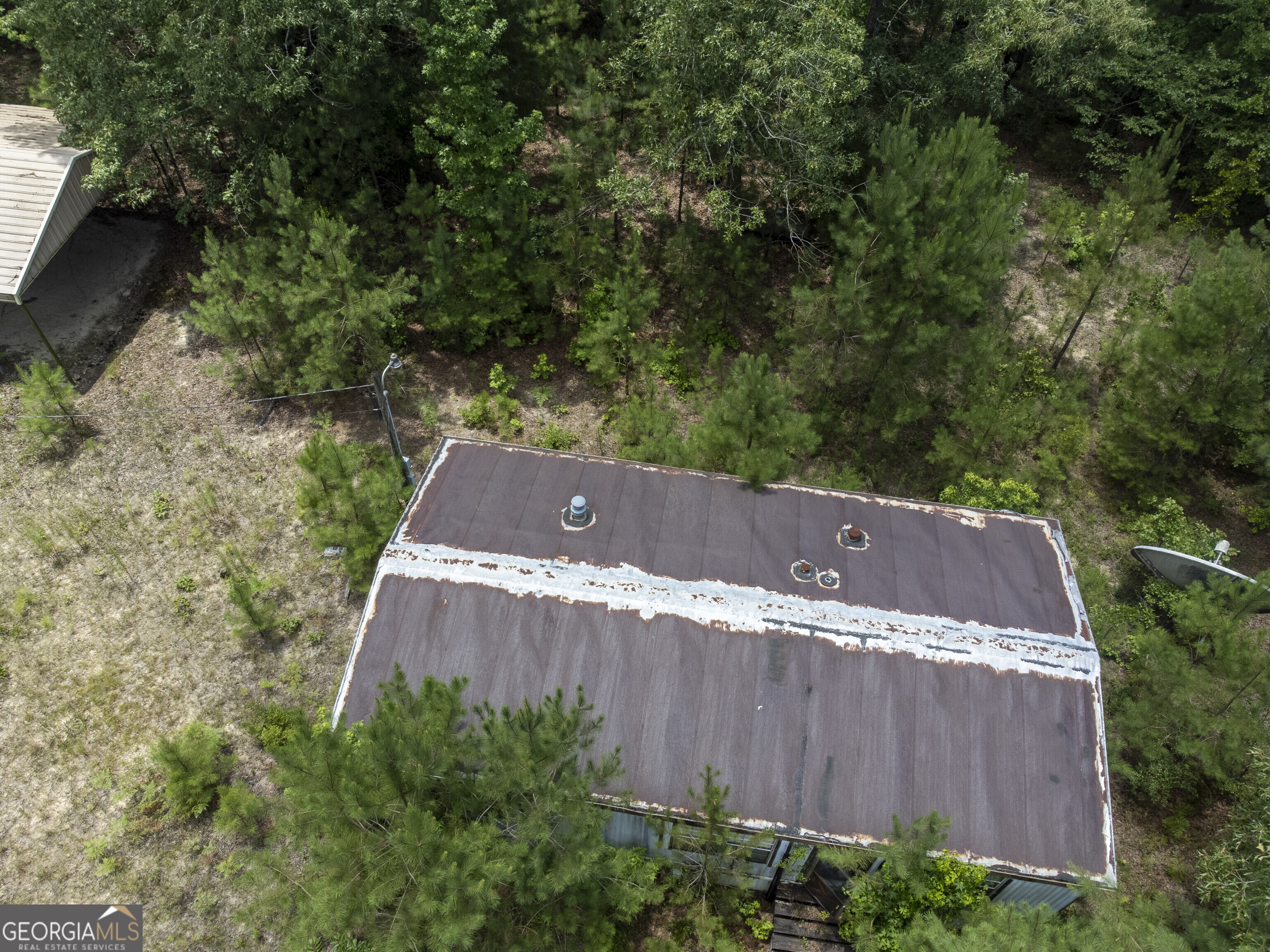 456 Horseshoe Circle Macon, GA 31217 - Photo 20 of 34 an aerial view of a house with a yard and large tree