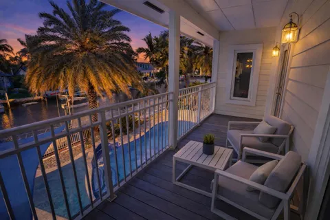 a view of a house with swimming pool