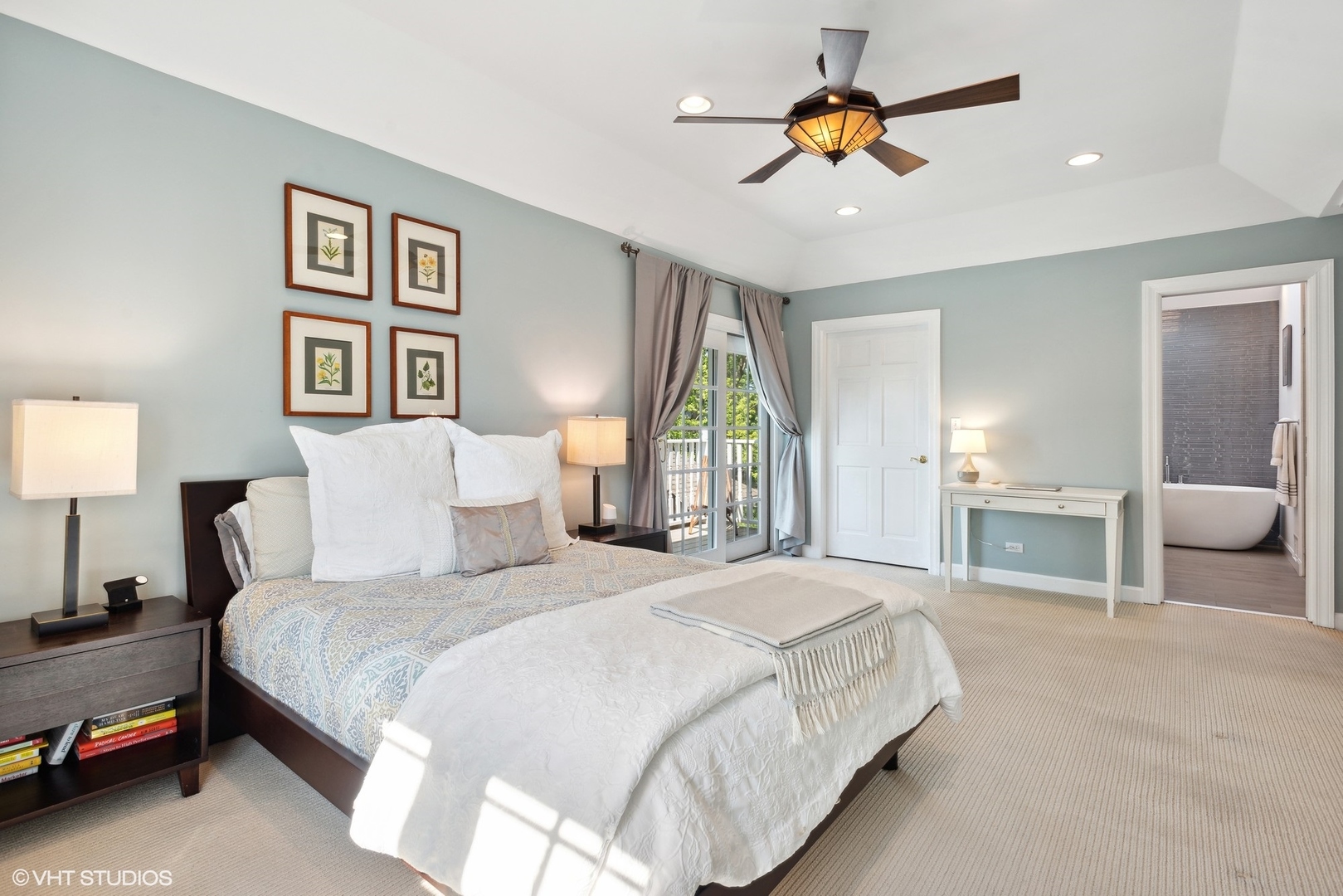 2320 Illinois Road Northbrook, IL 60062 - Photo 19 of 36 a bedroom with bed and a chandelier