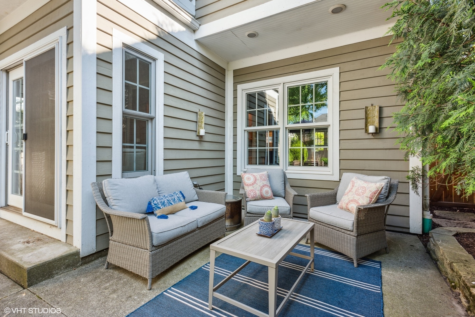 2320 Illinois Road Northbrook, IL 60062 - Photo 30 of 36 a view of a patio with couches and a potted plant on a table
