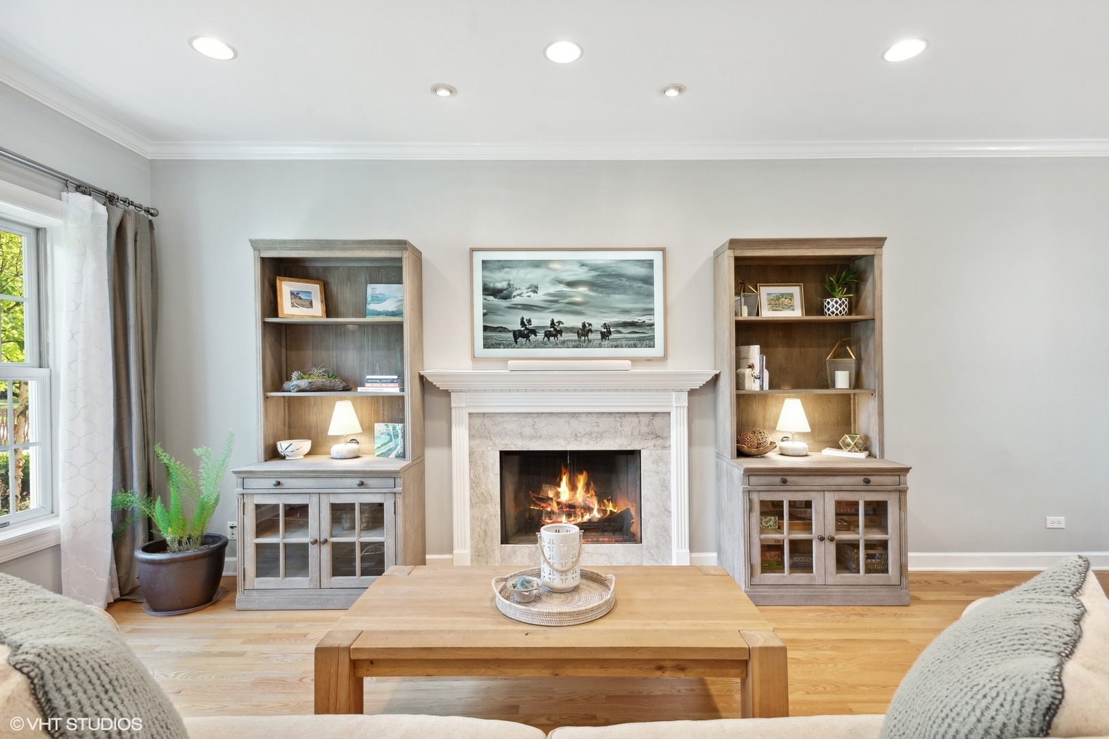 2320 Illinois Road Northbrook, IL 60062 - Photo 4 of 36 a living room with furniture and a fireplace