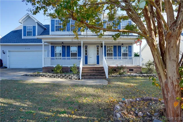 a house view with a garden space