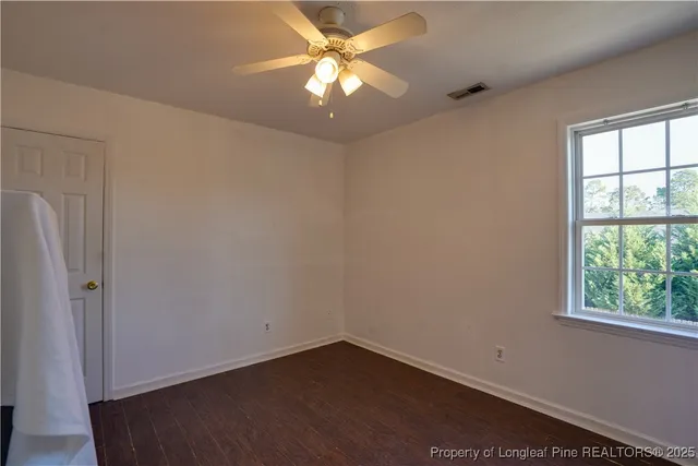 a house view with a backyard space