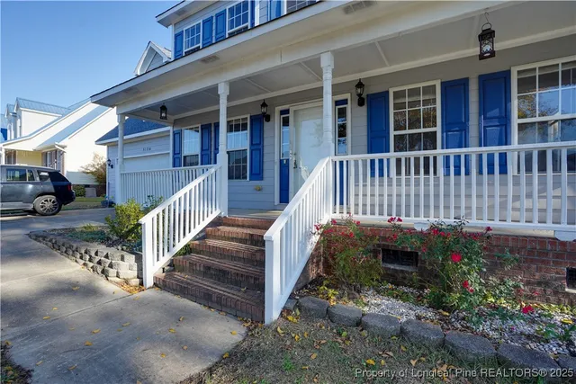a view of front door of stairs