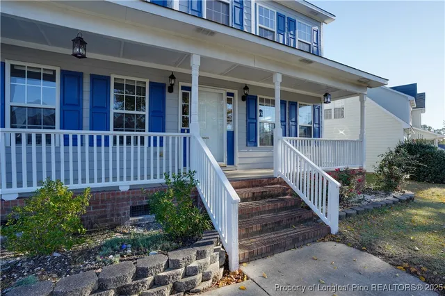 a view of workspace with wooden floor and window
