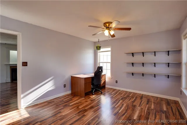 a kitchen that has a sink and a stove in it