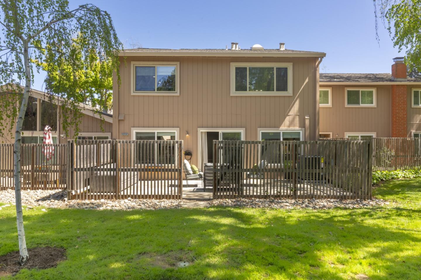 22856 Poplar Grove Square Cupertino, CA 95014 - Photo 39 of 82 a front view of a house with a yard