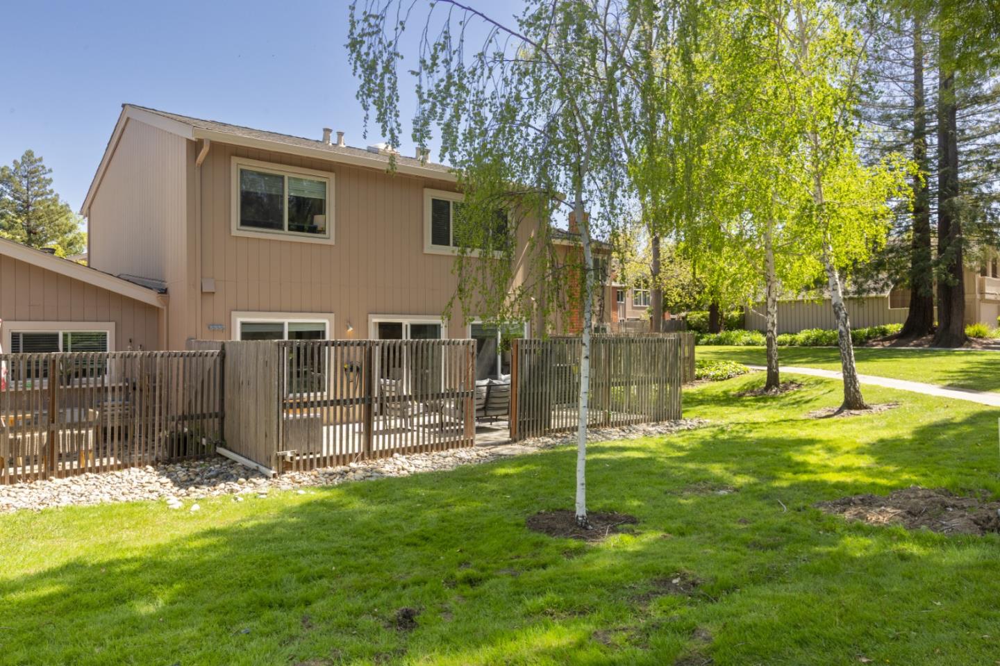 22856 Poplar Grove Square Cupertino, CA 95014 - Photo 40 of 82 a view of a house with a backyard and a tree