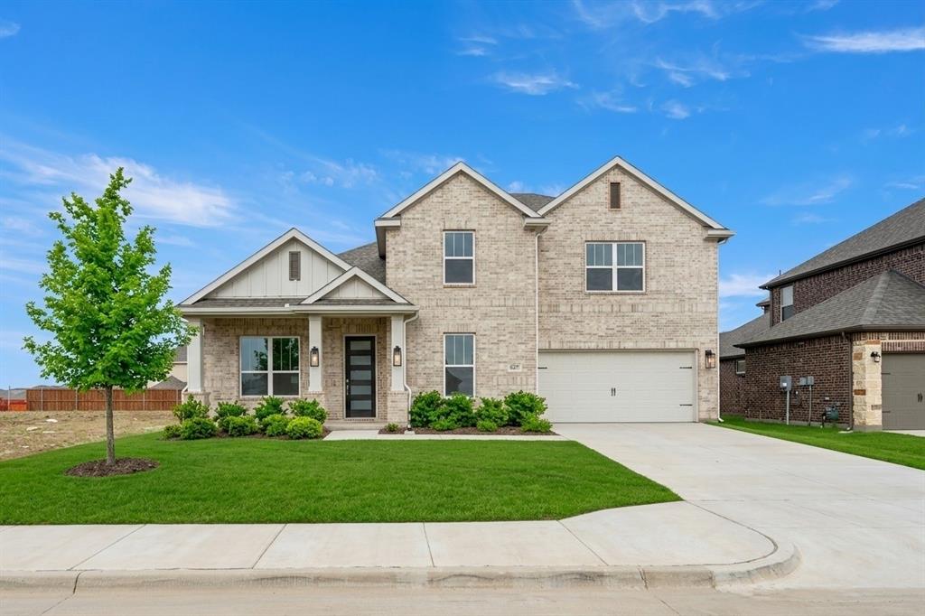 4357 Noble Lane Midlothian, TX 76065 - Photo 1 of 31 a front view of a house with a yard and garage