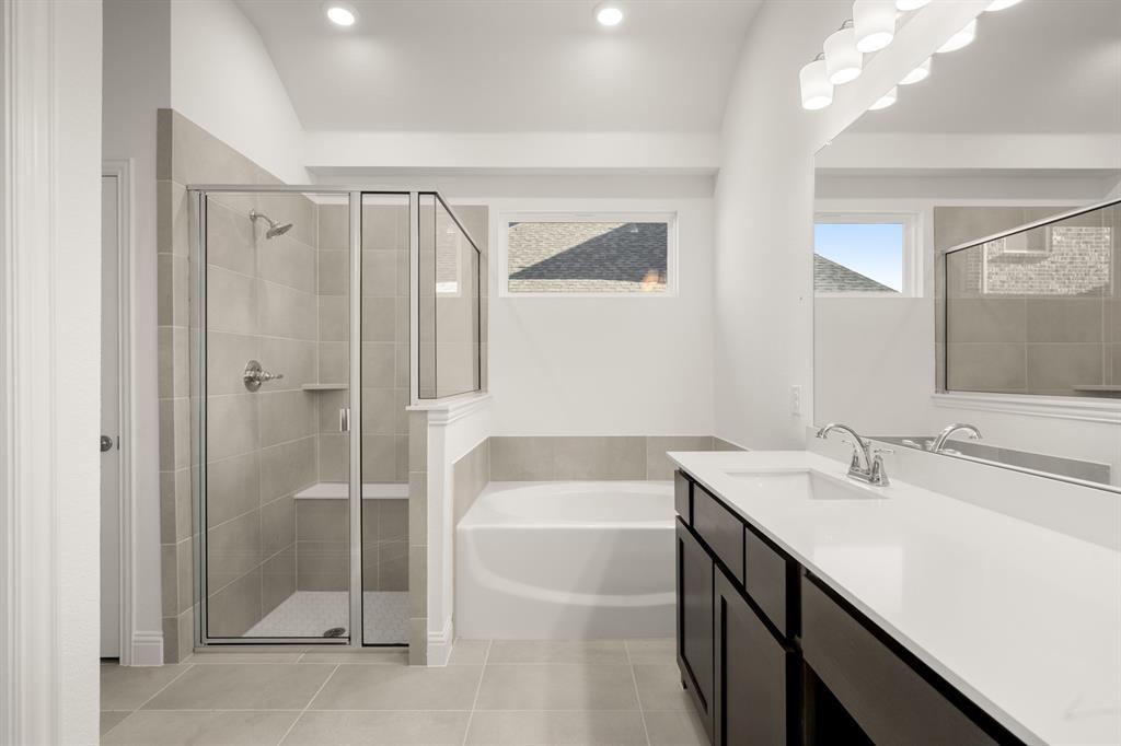4357 Noble Lane Midlothian, TX 76065 - Photo 12 of 31 a bathroom with a sink a toilet and shower