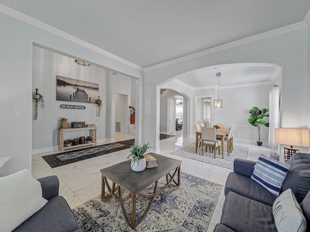 4332 Millsop Drive Carrollton, TX 75010 - Photo 14 of 37 a living room with furniture and wooden floor
