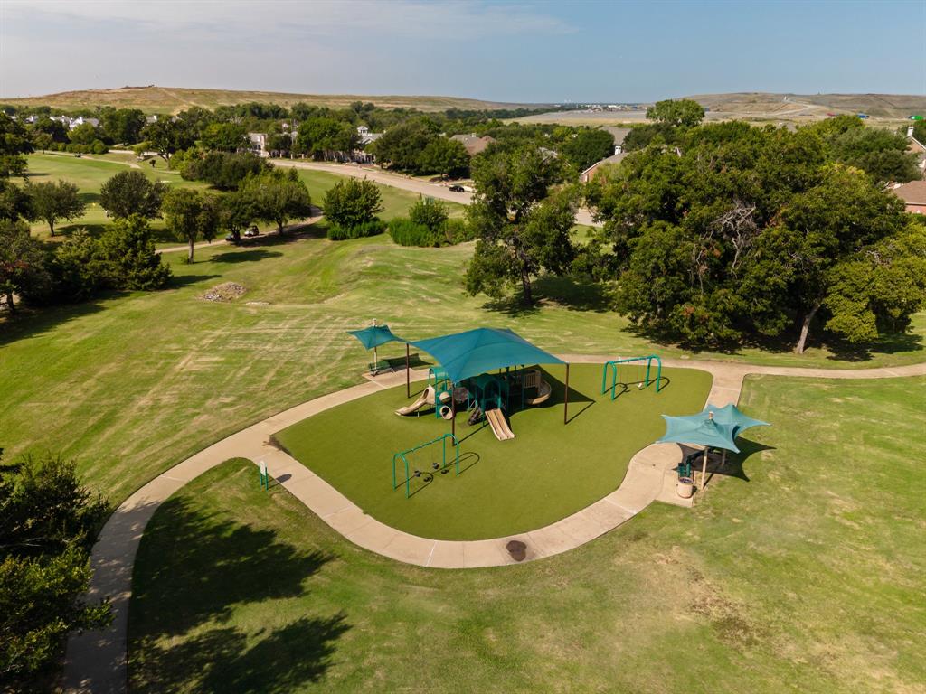 4332 Millsop Drive Carrollton, TX 75010 - Photo 33 of 37 a view of a swimming pool