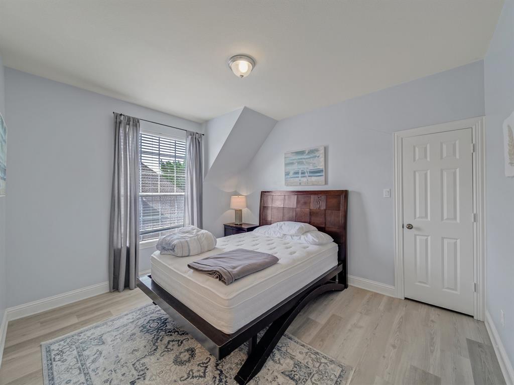 4332 Millsop Drive Carrollton, TX 75010 - Photo 4 of 37 a room with a bed and a window