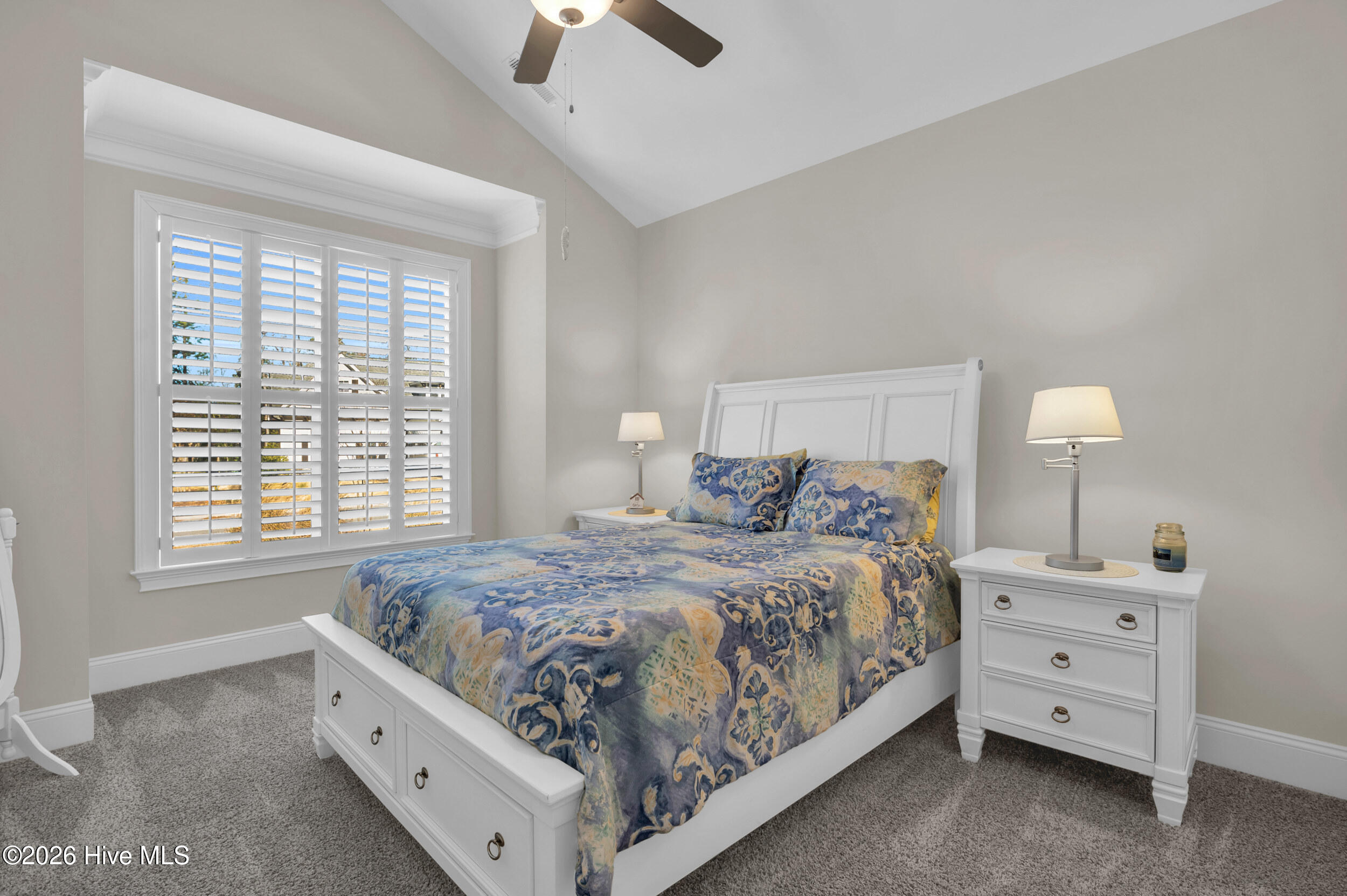 9614 Hidden Plum Road Northeast Leland, NC 28451 - Photo 18 of 53 Bedroom 2 with vaulted ceiling