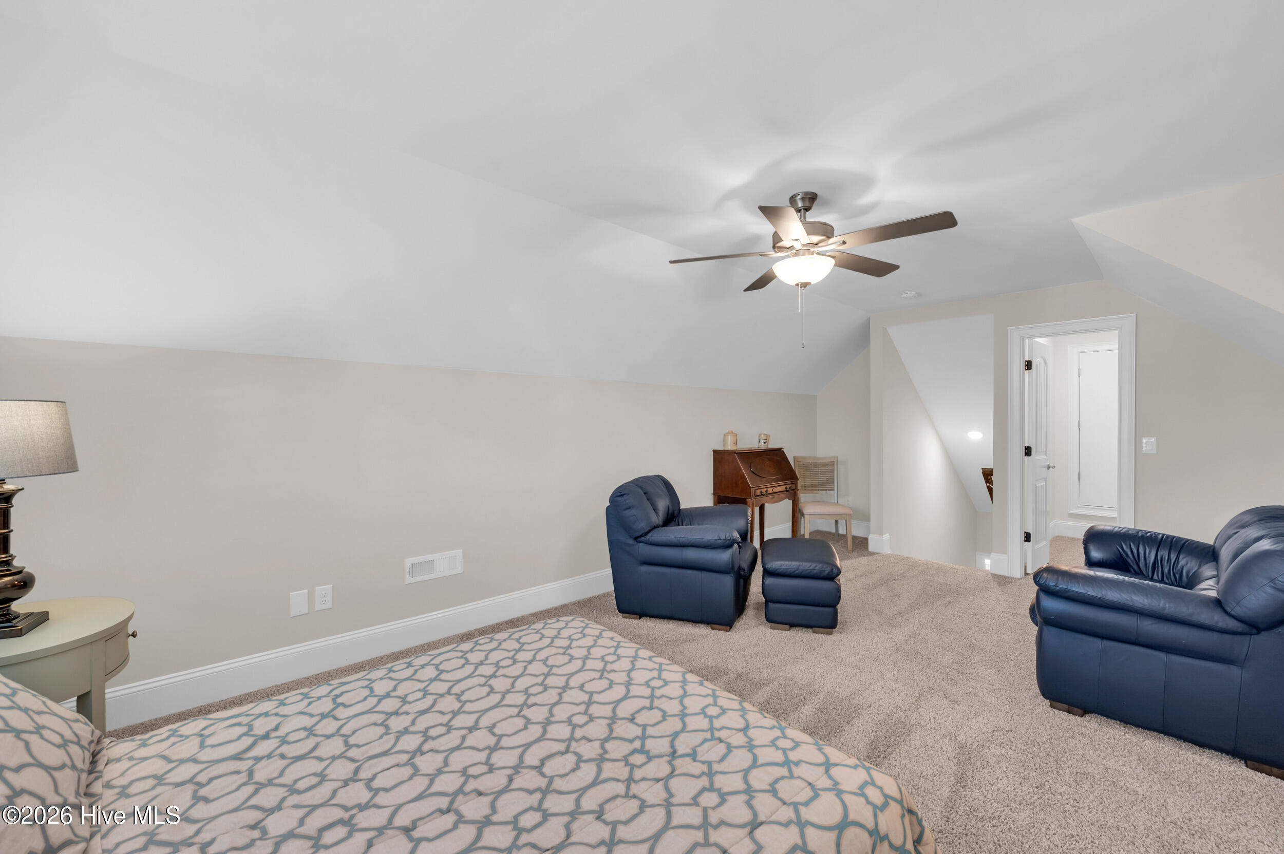 9614 Hidden Plum Road Northeast Leland, NC 28451 - Photo 25 of 53 Bonus room with closet and access to the floored attic