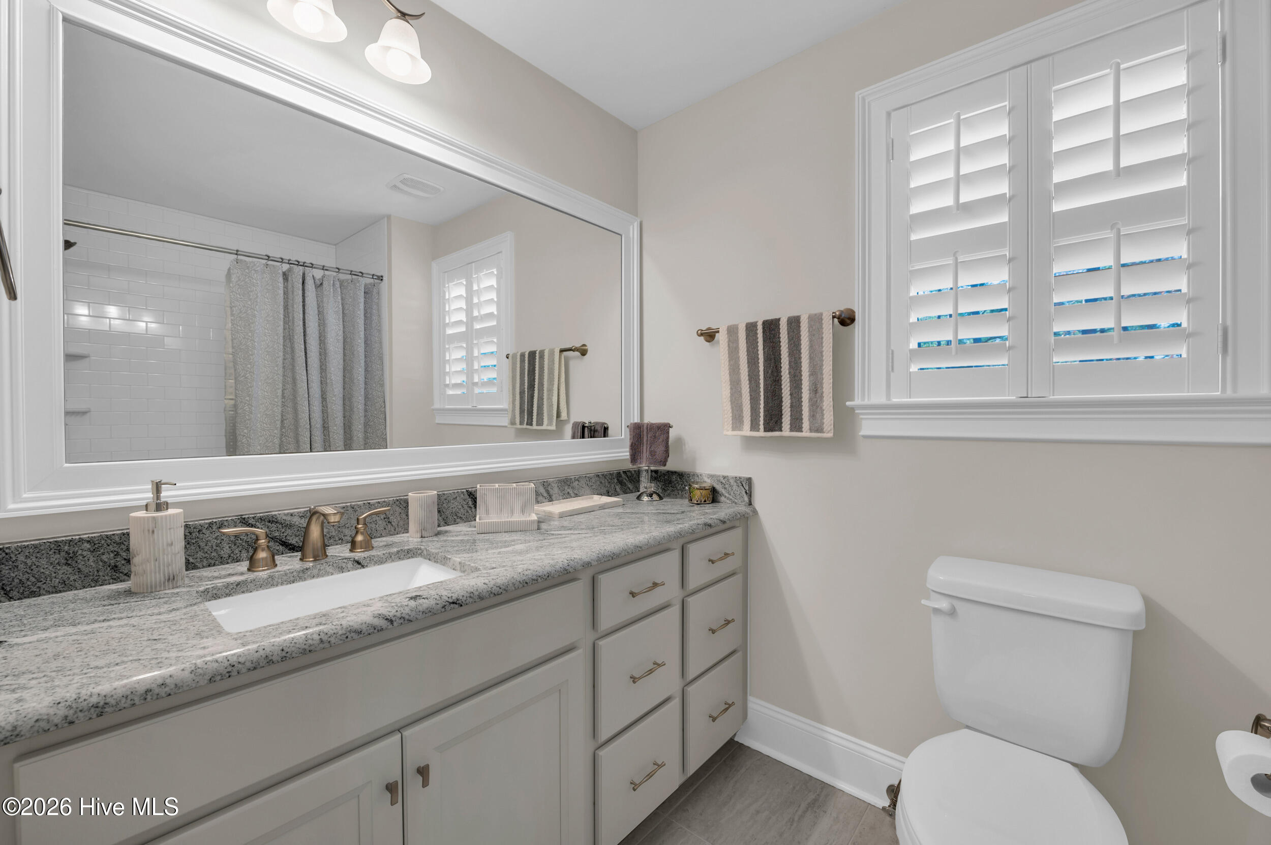 9614 Hidden Plum Road Northeast Leland, NC 28451 - Photo 26 of 53 Full bath on 2nd level with tile to ceiling shower/tub