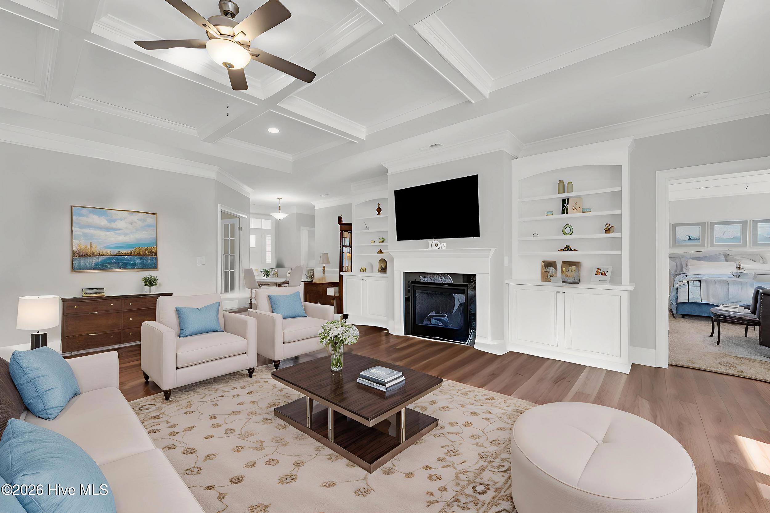 9614 Hidden Plum Road Northeast Leland, NC 28451 - Photo 7 of 53 Living room with coffered ceiling & fan