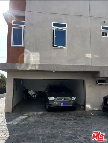 a car parked in front of a building