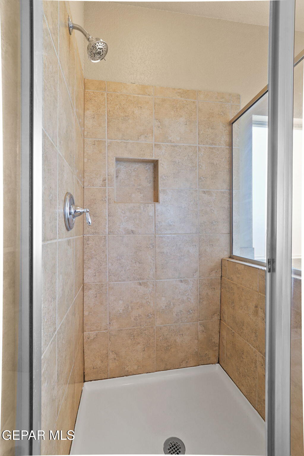 14353 Arabian Point El Paso, TX 79938 - Photo 24 of 48 a bathroom with a shower
