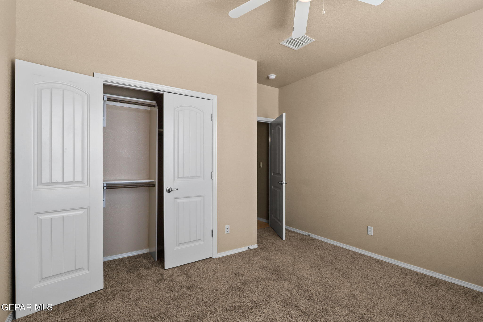 14353 Arabian Point El Paso, TX 79938 - Photo 27 of 48 an empty room with closet