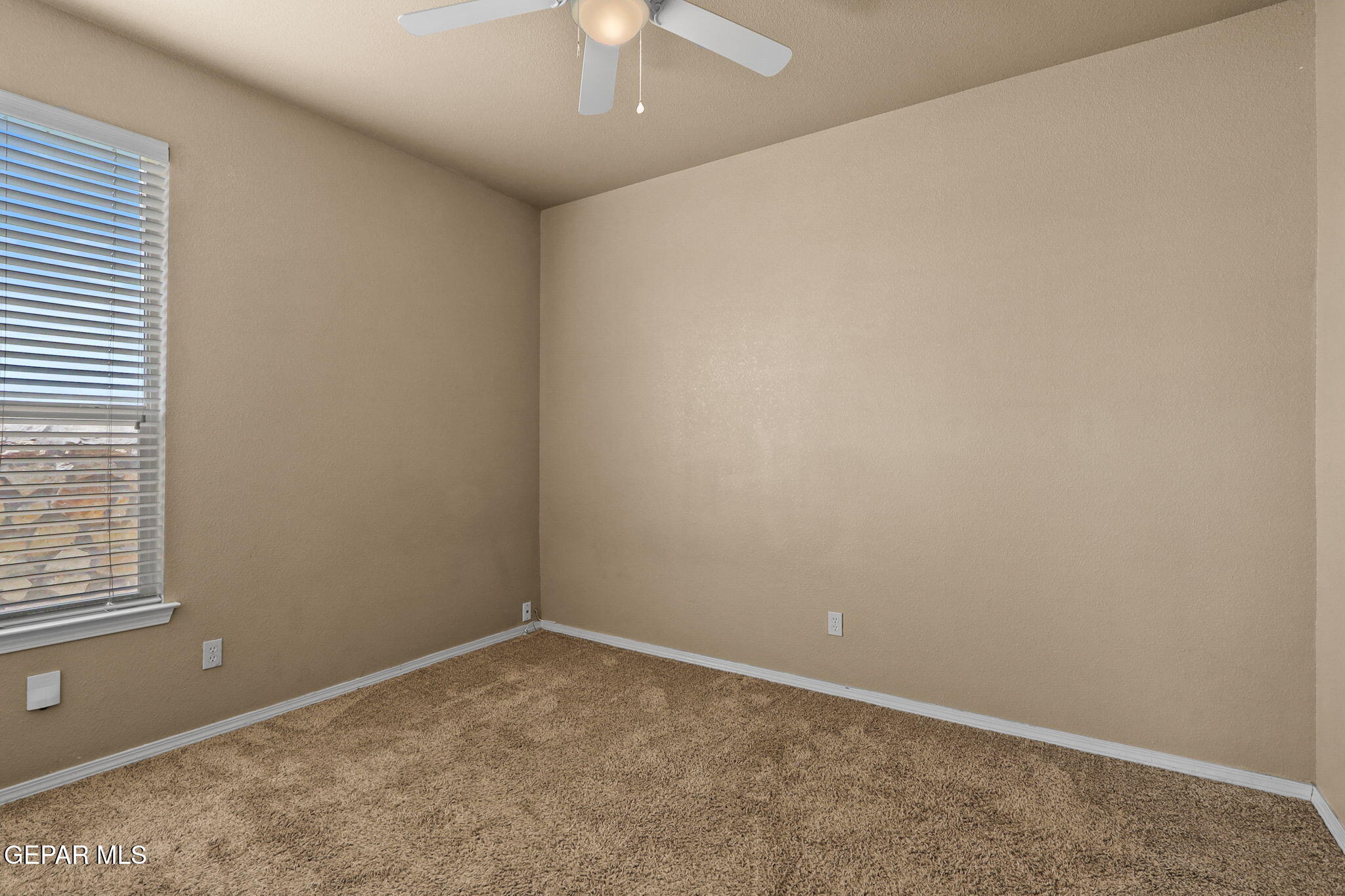 14353 Arabian Point El Paso, TX 79938 - Photo 28 of 48 an empty room with a window