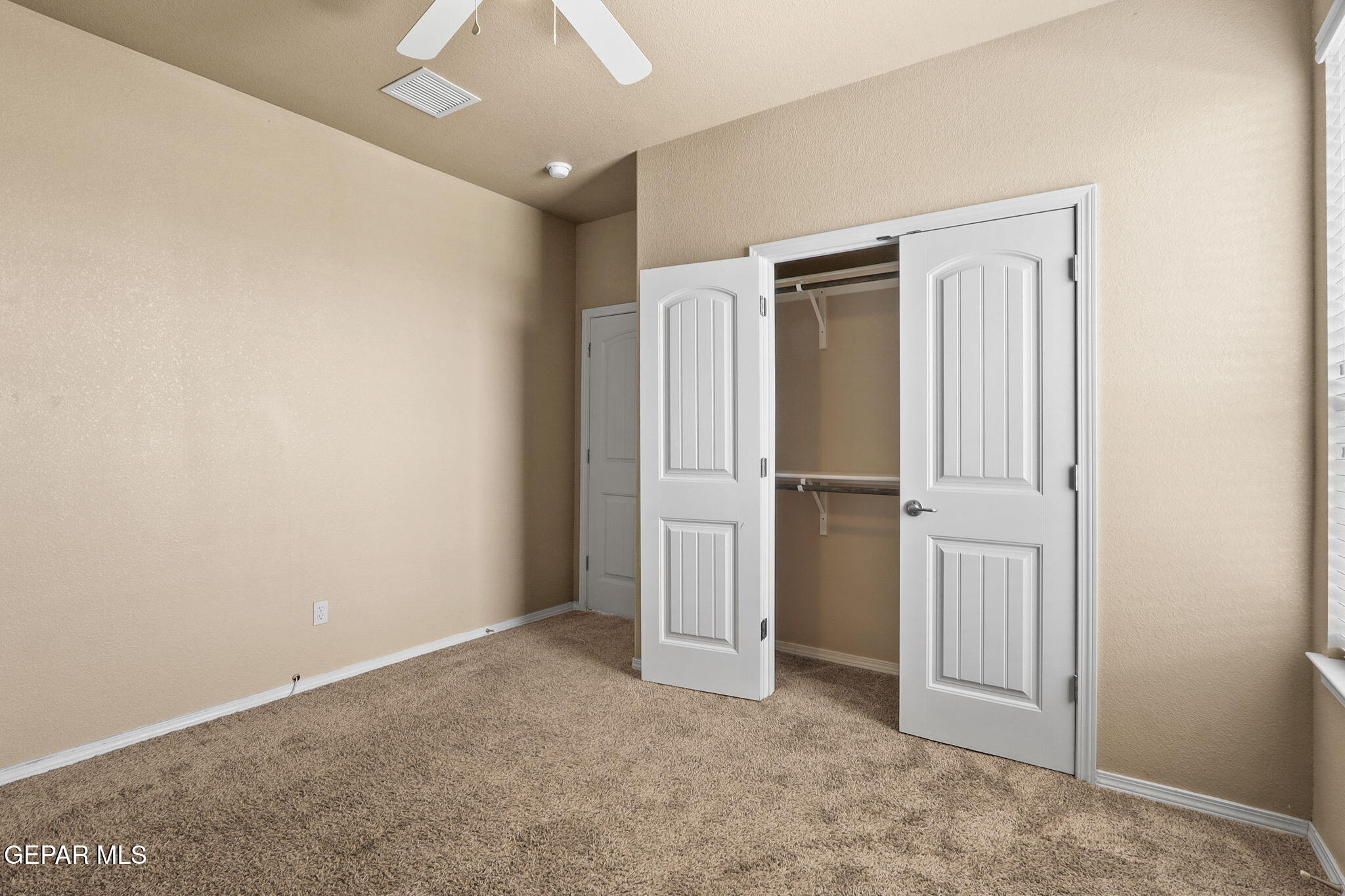 14353 Arabian Point El Paso, TX 79938 - Photo 29 of 48 an empty room with closet area