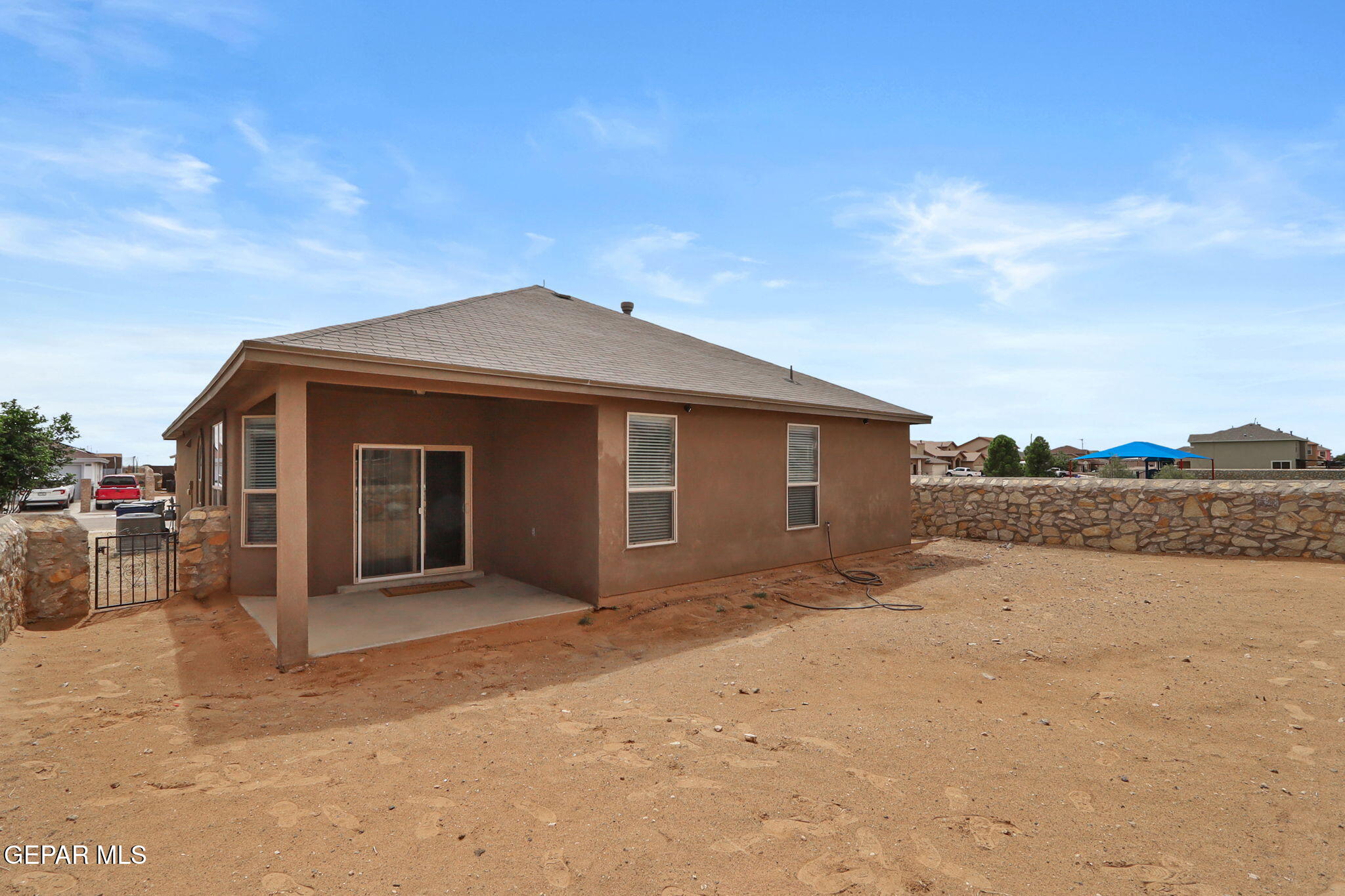 14353 Arabian Point El Paso, TX 79938 - Photo 34 of 48 a view of a house with a patio