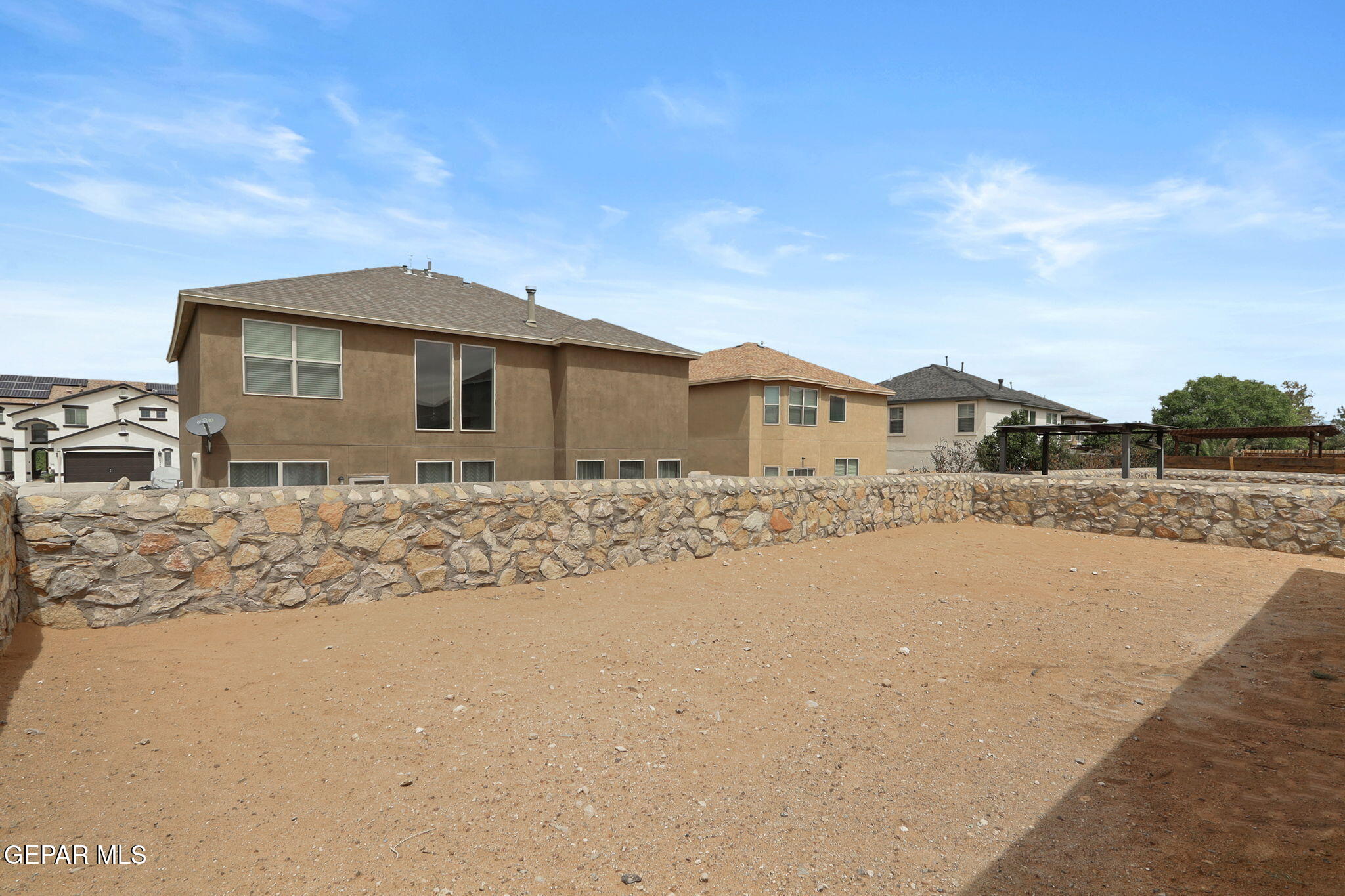 14353 Arabian Point El Paso, TX 79938 - Photo 36 of 48 a front view of a house with a yard
