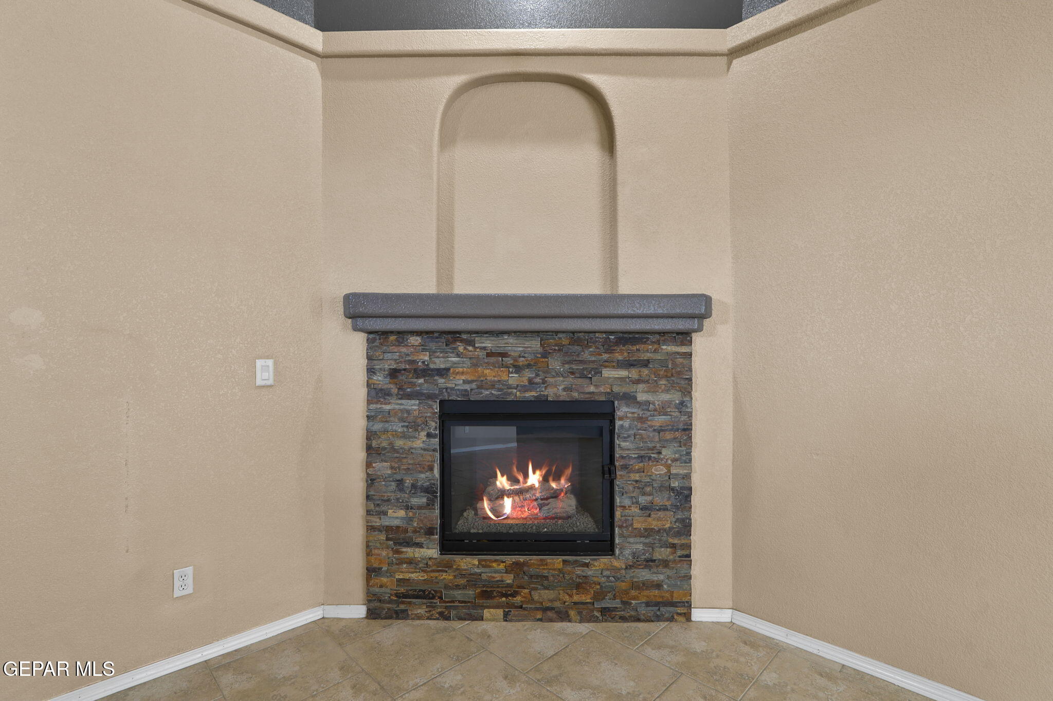 14353 Arabian Point El Paso, TX 79938 - Photo 8 of 48 a close view of a fireplace