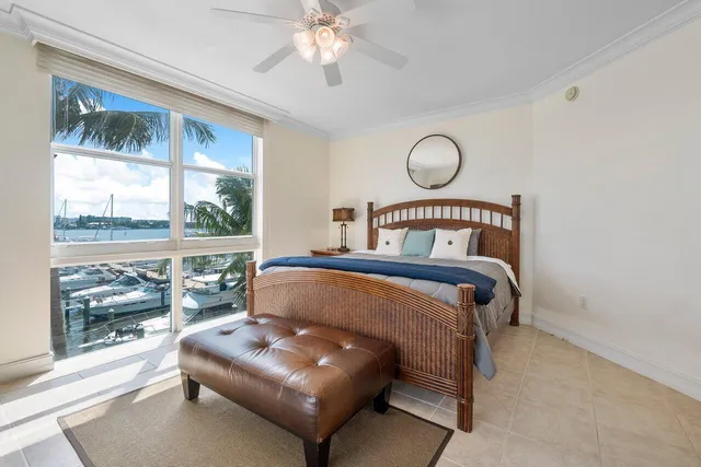 a bedroom with a bed and with furniture