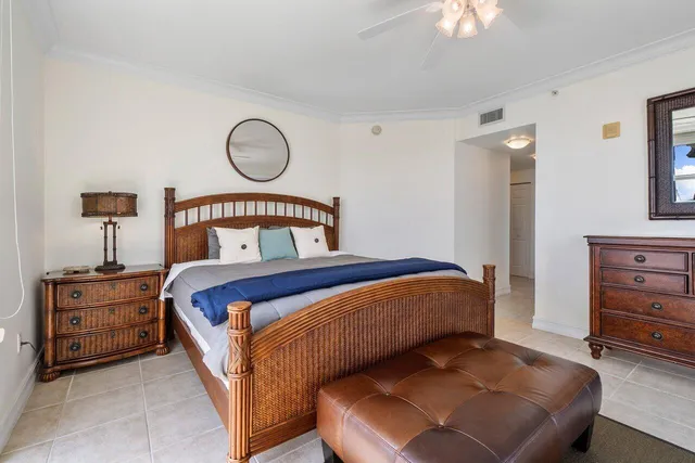 a living room with furniture and a lamp