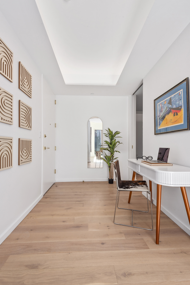 330 Grand Street, Unit 2B Manhattan, NY 10002 - Photo 8 of 16 a workspace with furniture and window